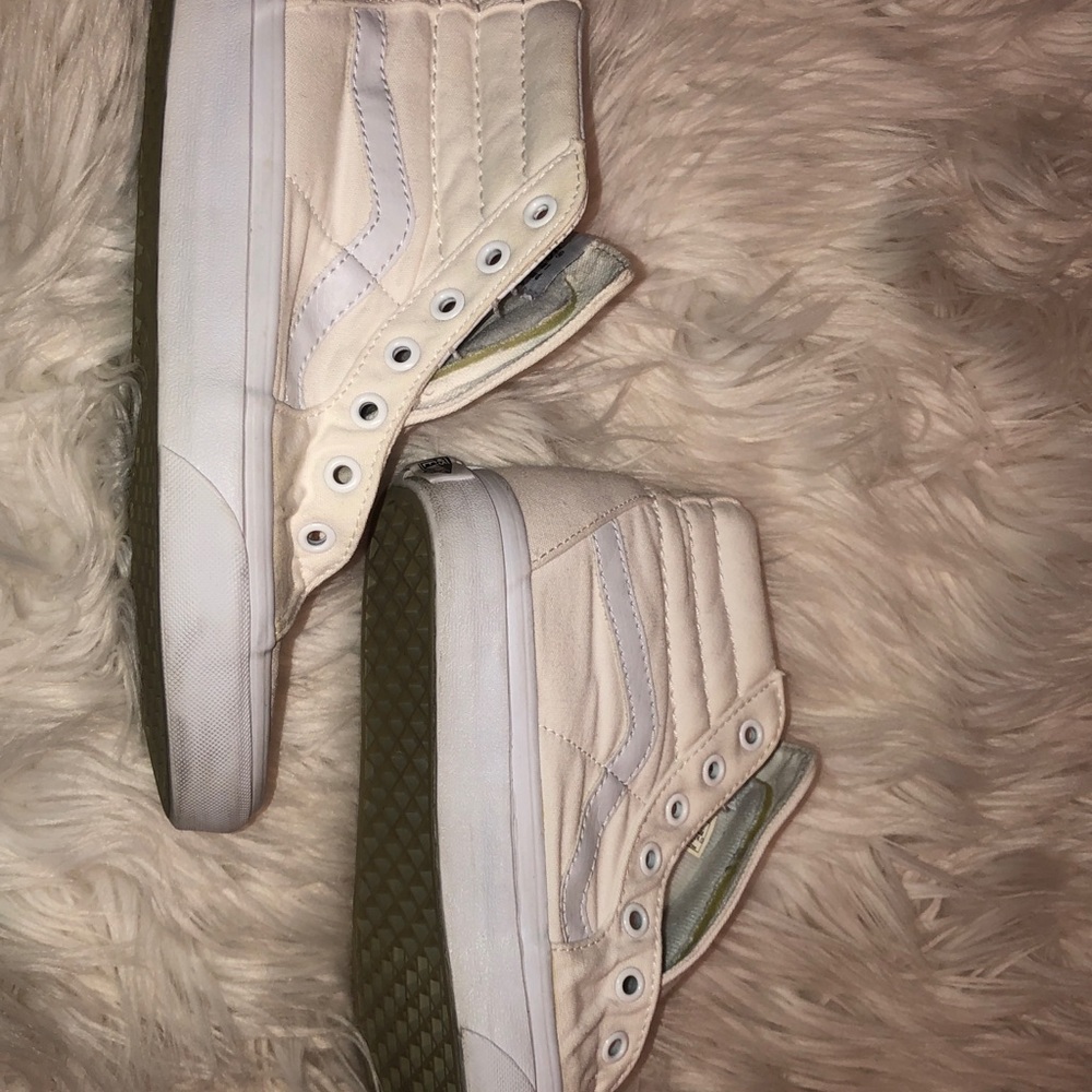White vans, no laces.